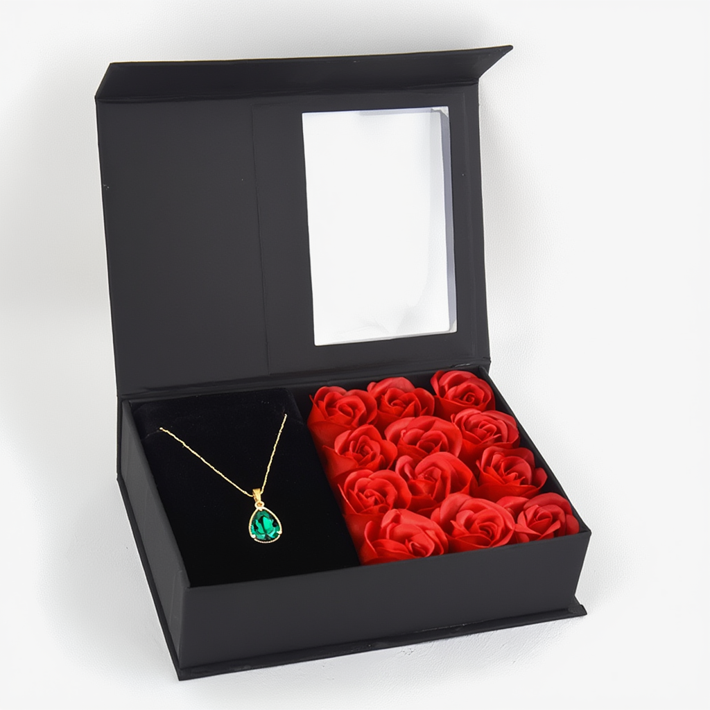 Presentbox med röda rosor och 18K förgyllt halsband.